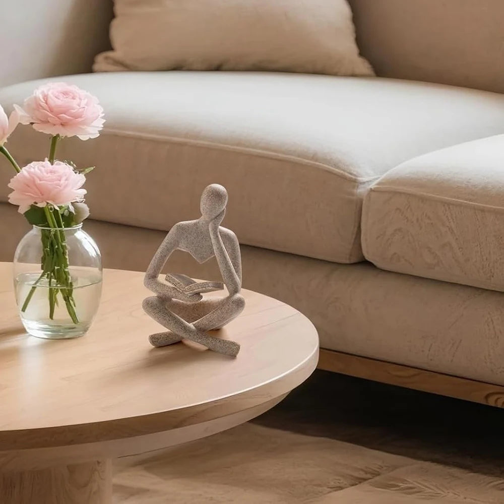 Moderne Dekofigur „Lesender Mensch“ – Beige